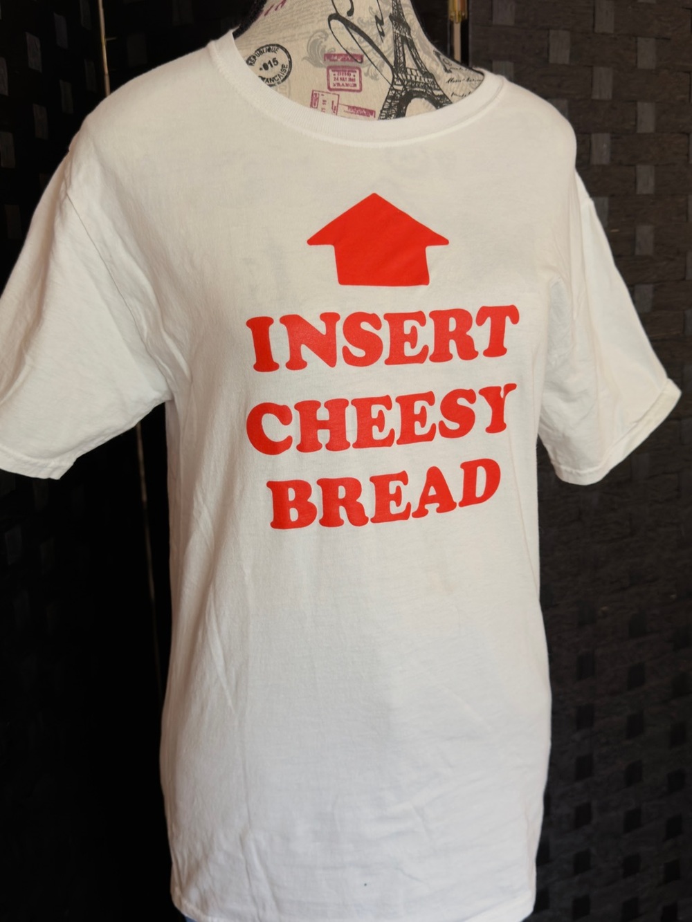 White Graphic Tee with Red "INSERT CHEESY BREAD" Print